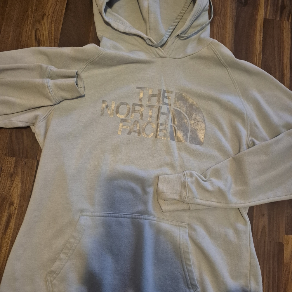 The North Face Light Beige Hoodie with Metallic Gold Logo